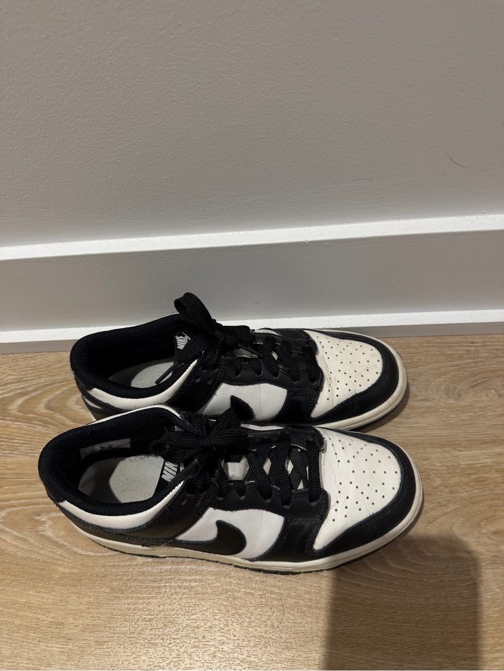 NIKE
White & Black Dunk Low Sneakers